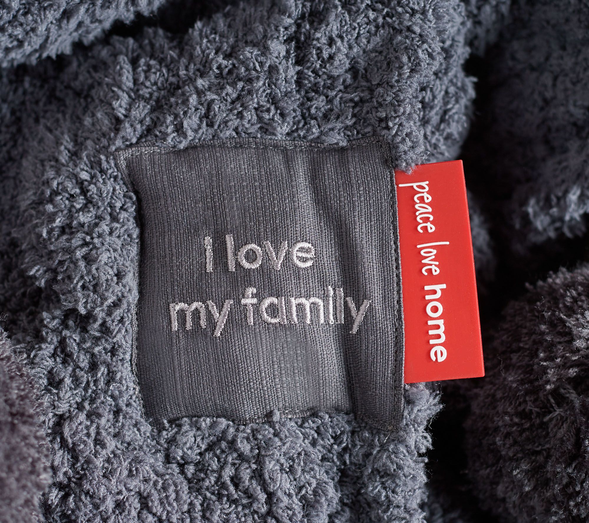 Peace Love World 60" x 70" Plush Cable Knit Throw with PomPoms Page