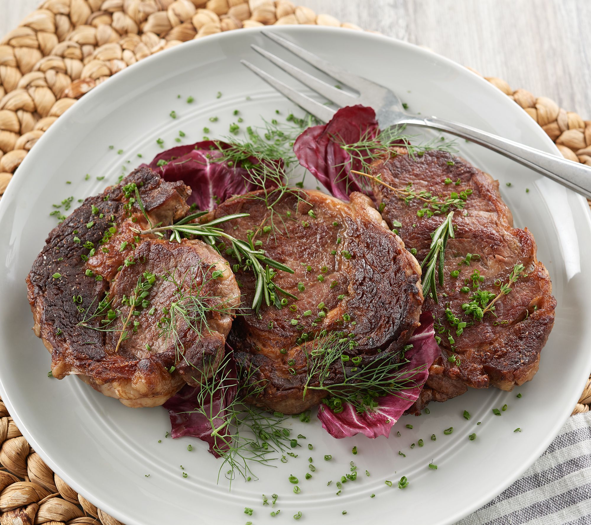 Rastelli's (12) 9-oz Black Angus Ribeye Steaks